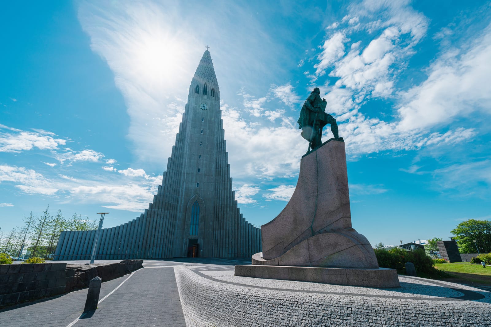 Reykjavík: Hallgrímskirkja church and statue, sun star.